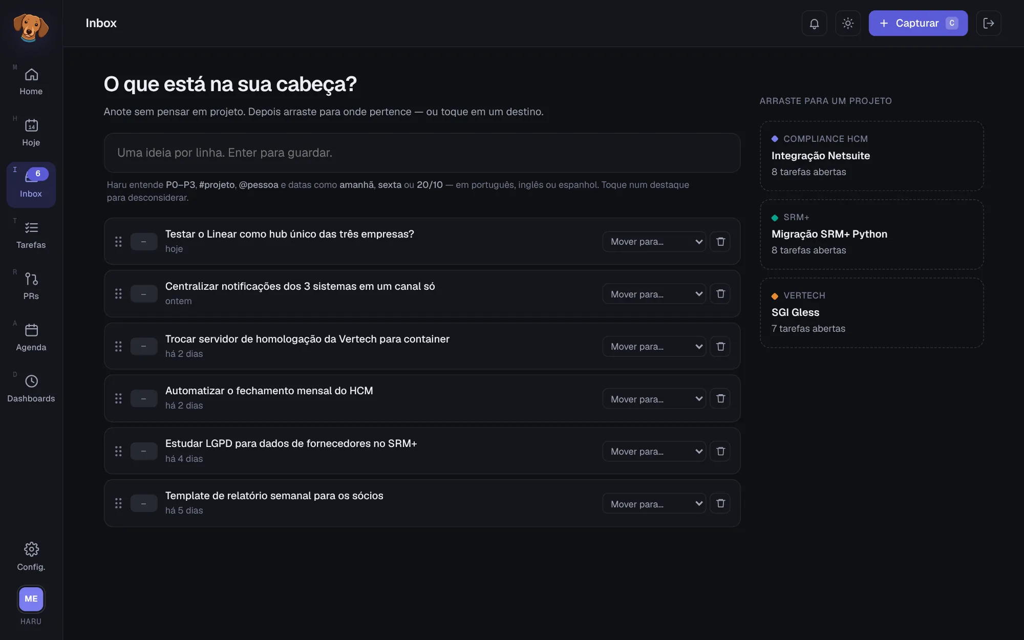 Inbox com o título O que está na sua cabeça?, o campo de captura, a lista de ideias e, à direita, a coluna Arraste para um projeto